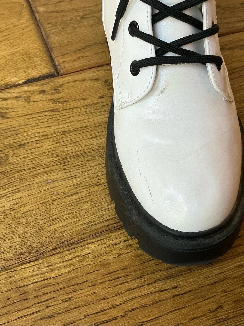 Steve Madden White Lace-Up Combat Boots with Black Lug Sole